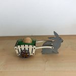 Hase mit weißer Kutsche